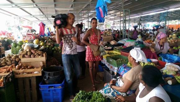 RTP Africa's show Nha Terra, Nha Kretcheu documenting For Life Inc Founder Madame-Athena Chang healthy food shopping for one of our families